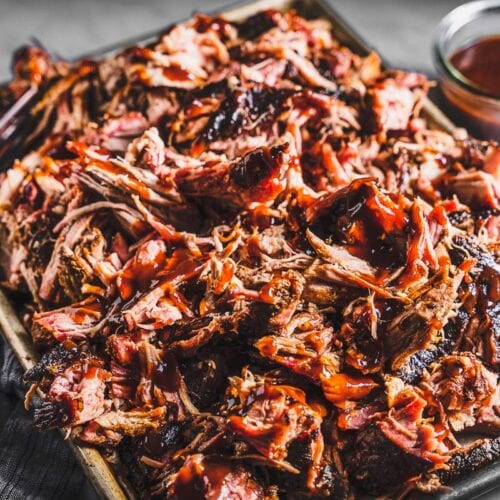 bbq-pulled-pork-on-a-sheet-pan-with-bbq-sauce-horizontal-1-500x500